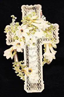 Filigree: White flowers on a cross-shaped Easter card