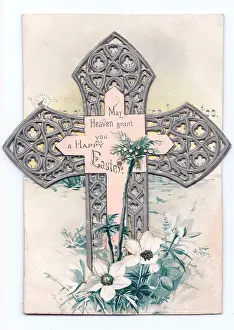 White flowers and an ornate cross on an Easter card