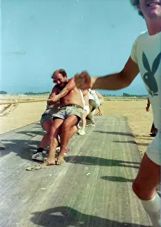 The British Caribbean History Collection: White men pulling rope in Oman