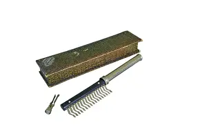 Scalp: White's Electric Comb with box