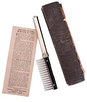 Scalp: White's Electric Comb with box and instructions