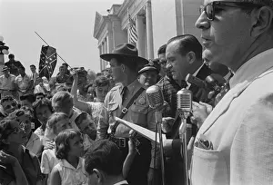 Segregationist: Whites protesting the court ordered re-opening ?