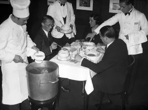 Restaurants: WHW stew eating in a restaurant, 1934