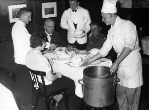 Solidarity: WHW stew eating in a restaurant, 1934