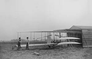 Firsts: Wilbur and Orville Wright with their second