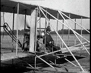 Kitty: Wilbur Wright Boarding A Wright Brothers Plane