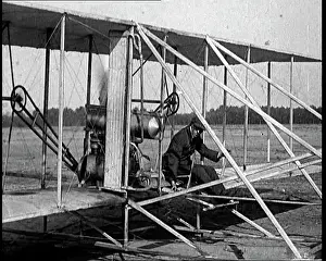 Kitty: Wilbur Wright Boarding A Wright Brothers Plane
