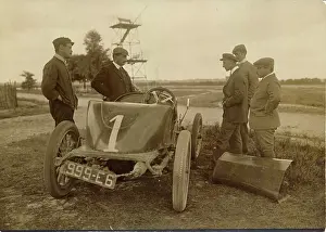 Mans: Wilbur Wright examining the engine of the Delage