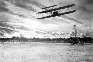 Wilbur: Wilbur Wright flies with a passenger, 1908