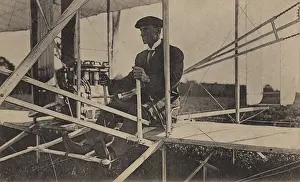 Firsts: Wilbur Wright sits at the controls of his