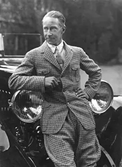 Headlights: Wilhelm of Prussia in front of a convertible, 1925