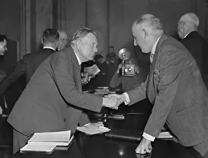 Adversaries: William Borah greets former Brain Truster Raymond