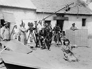 Colleen: William Seiter and Colleen Moore during filming of Smiling