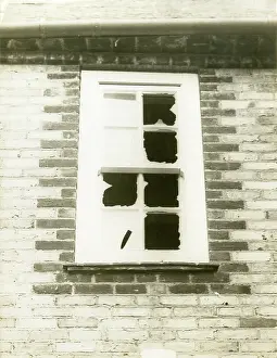 Harry Price: Window broken by suffragettes