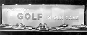 Dunlops: Window display for Dunlop's Golf is Our Game