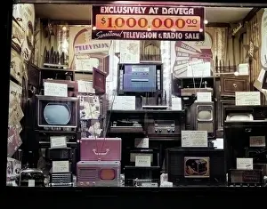 Storefront: Window of Store Selling Radios and Televisions