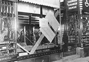 Collapse: Windows broken by Communists in Berlin, 1931