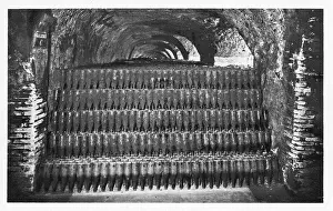 Storing: Wine bottles stored in a cellar, gathering dust