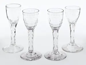 Stemware: Four wine glasses