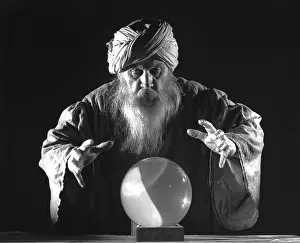 Hovered: Wizard Man With Hands Out and Around Crystal Ball