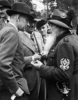 Compound: Wolfgang von Gronau with a forester, 1938
