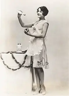 Winking: Woman adding salt to hot dog