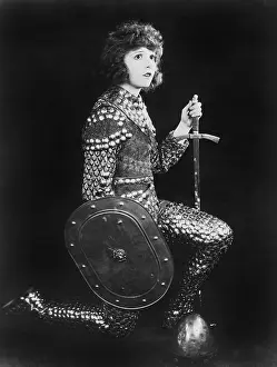 Honorable: Woman in armor kneeling