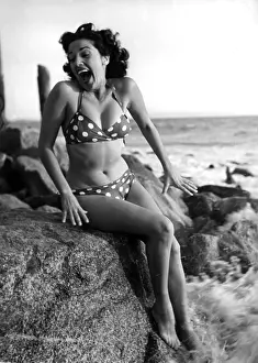 Bikinis: Woman on the beach 1950s