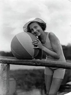 Souwester: Woman and beach ball