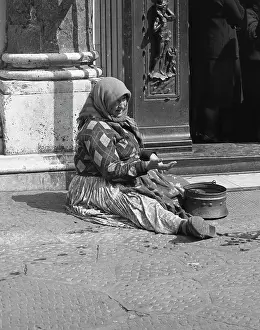 Tony Boxallfrps: Woman begging in front of a church