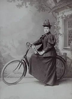 Tricycles: Woman with bicycle in the studio