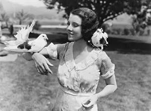 Gentleness: Woman with birds