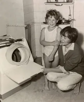 London Fire Brigade: Woman and boy in a kitchen
