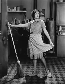 Daydreaming: Woman with broom