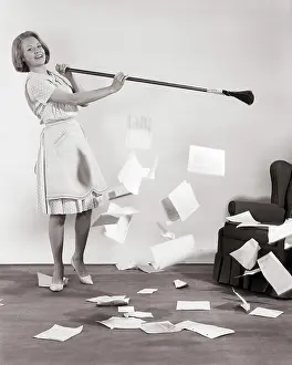 Hoes: Woman with Broom Sweeping up Papers Bills Making
