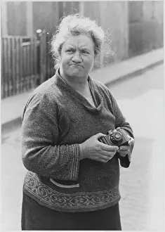 Butch: WOMAN WITH HER CAMERA