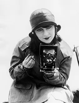 Chauffeur: Woman with camera