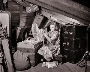 Attics: Woman in Cluttered Attic Wearing Apron Looking