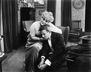 Consoling: Woman consoling a sad man