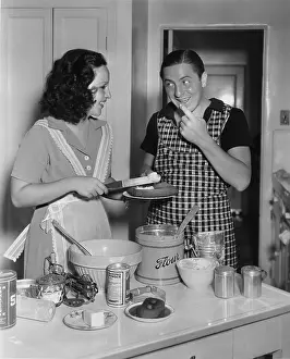 Indulgence: Woman cooking dessert in the kitchen