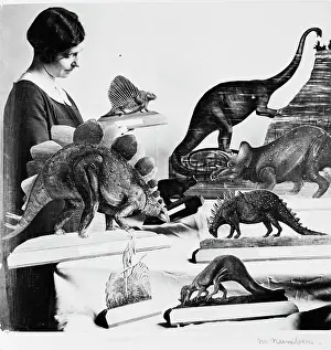 Dinosauria: Woman with dinosaur models, 1926