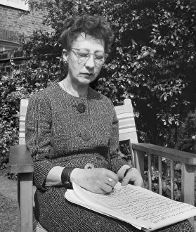 Savile: Woman doing automatic writing in a garden