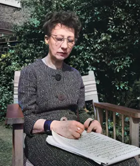 Savile: Woman doing automatic writing in a garden