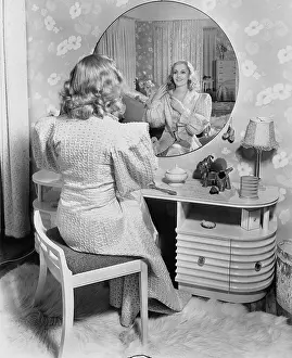 Pampered: Woman at the dressing table