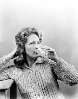 Ribbing: Woman drinking water