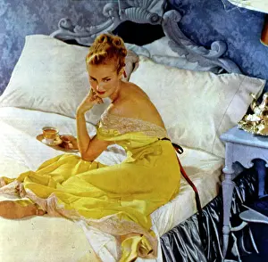 Slinky: Woman eating breakfast in bed