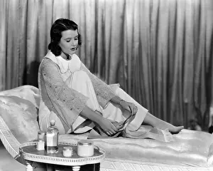 Pedicure: Woman filing toenails