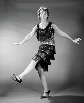Sequin: Woman in flapper costume dancing