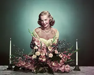 Woman In Formal Attire At Dining Table