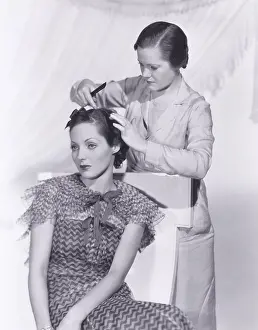 Beautician: Woman getting her hair done